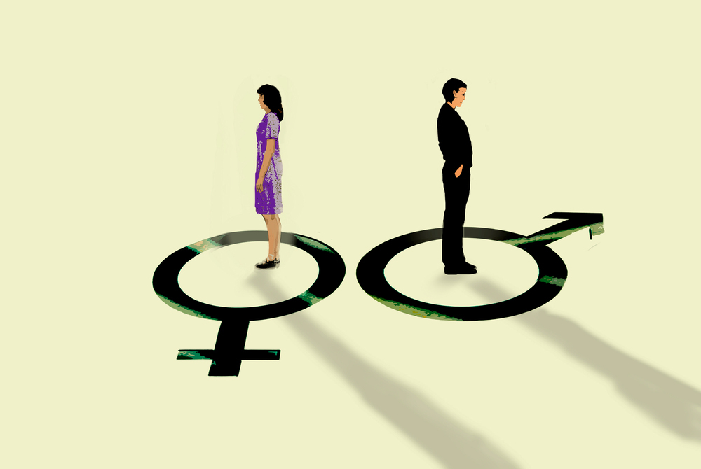 여성과 남성 성별 기호 위에 각각 서 있는 두 사람의 모습입니다. 이는 젠더 갈등 또는 성별 간의 차이를 시각적으로 표현한 것입니다.